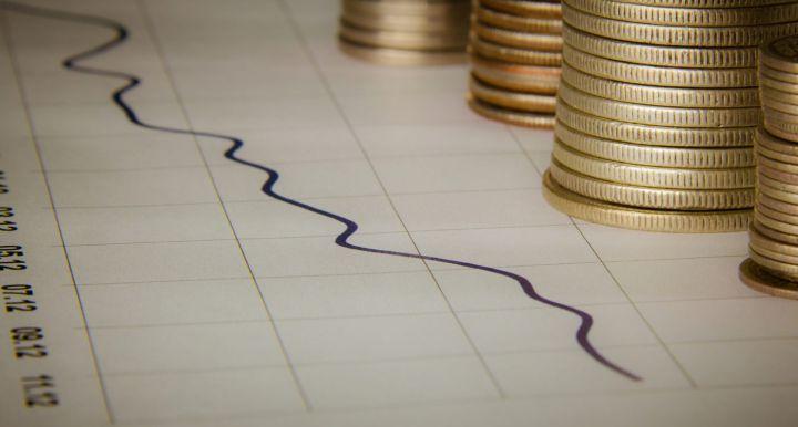 image of coins on line chart